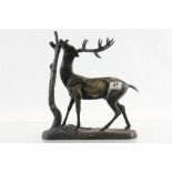 After Mene large bronze sculpture of a deer by tree unsigned.