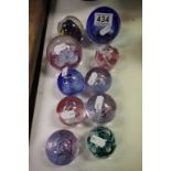 Collection of ten mainly Caithness paperweights to include Millenium edition