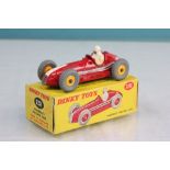 Boxed Dinky 231 Maserati Racing Car in red with white driver, white to front, yellow hubs, race