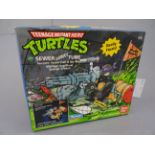 Original boxed Playmates Bandai Teenage Mutant Hero Turtles Sewer Army Tube vehicle appearing sealed