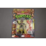Carded Playmates Teenage Mutant Ninja Turtles Fugitoid figure, unpunched, vg