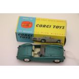 Boxed Corgi 302 MGA Sports Car in metallic green, with windscreen, diecast vg but a little grubby,