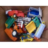 Collection of Britains die-cast farming vehicles including many tractors
