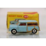 Boxed Dinky 199 Austin Seven Countryman in pale blue with red interior, diecast gd, box good to