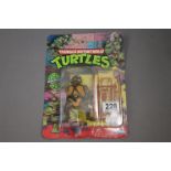 Carded Playmates Bandai Teenage Mutant Ninja Turtles Donatello figure, unpunched, creasing to top of