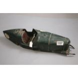 Vintage tin plate racing car shell, in British Racing Green, 20" in length, showing wear