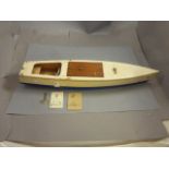 Kellner clockwork Speed boat with wooden hull, approx 32" in length, with key