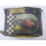 Boxed Tri-ang Scalextric GP1 Grand Prix series with both slot cars, tatty box