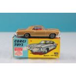 Boxed Corgi 245 Buick Riviera in gold with red interior, diecast excellent, box gd