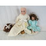 Early 20th century Simon & Halbig Bisque Headed Doll with sleeping blue eyes and open mouth and