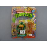 Original carded Playmates Bandai Teenage Mutant Hero Turtles Michaelangelo figure, unpunched,some