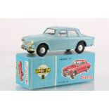 Boxed Triang Spot On 216 Volvo 122.S with sliding roof in powder blue and white interior, diecast