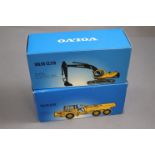 Two boxed Volvo 1:50 construction diecast model vehicles to include EC210 and A25C, made in China,