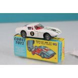 Boxed Corgi 324 Marcos 1800 GT with Volvo engine in white with race number 5, green stripes, red