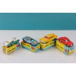 Four boxed Corgi diecast vehicles all with play wear and some repaints to include 309 Aston Martin