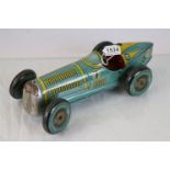 Mettoy tin plate clockwork racing car in pale blue with yellow & black finish, showing wear