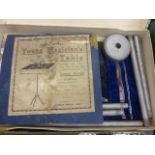 Ernest Sewell Cabinet of Conjuring tricks and a young magicians portable table, along with a