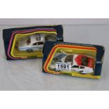 Two boxed Corgi diecast model vehicles to include 323 Ferrari Daytona 365 in white with blue & red