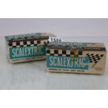 Two boxed Triang Scalextric slot cars to include C82 Lotus in green and C66 FJN Cooper in blue,