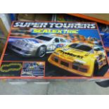Boxed Scalextric Super Tourers set complete with both slot cars plus an additional car