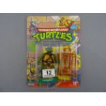 Original carded Playmates Bandai Teenage Mutant Hero Turtles Leonardo figure 20 back, unpunched,