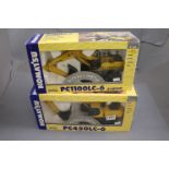 Two boxed Joal Komatsu diecast metal construction models to include 1:50 PC1100LC-6 & 1:32 PC450LC-