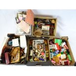 Large collection of various dolls house furniture and linen featuring wooden and plastic examples,