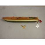 Kellner clockwork Speed boat with wooden hull, approx 18" in length, with key