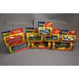 Eight Boxed Dinky 1970's Vehicles - McLaren 223, Police Mini Clubman 255, VW Porsche 914 208 and