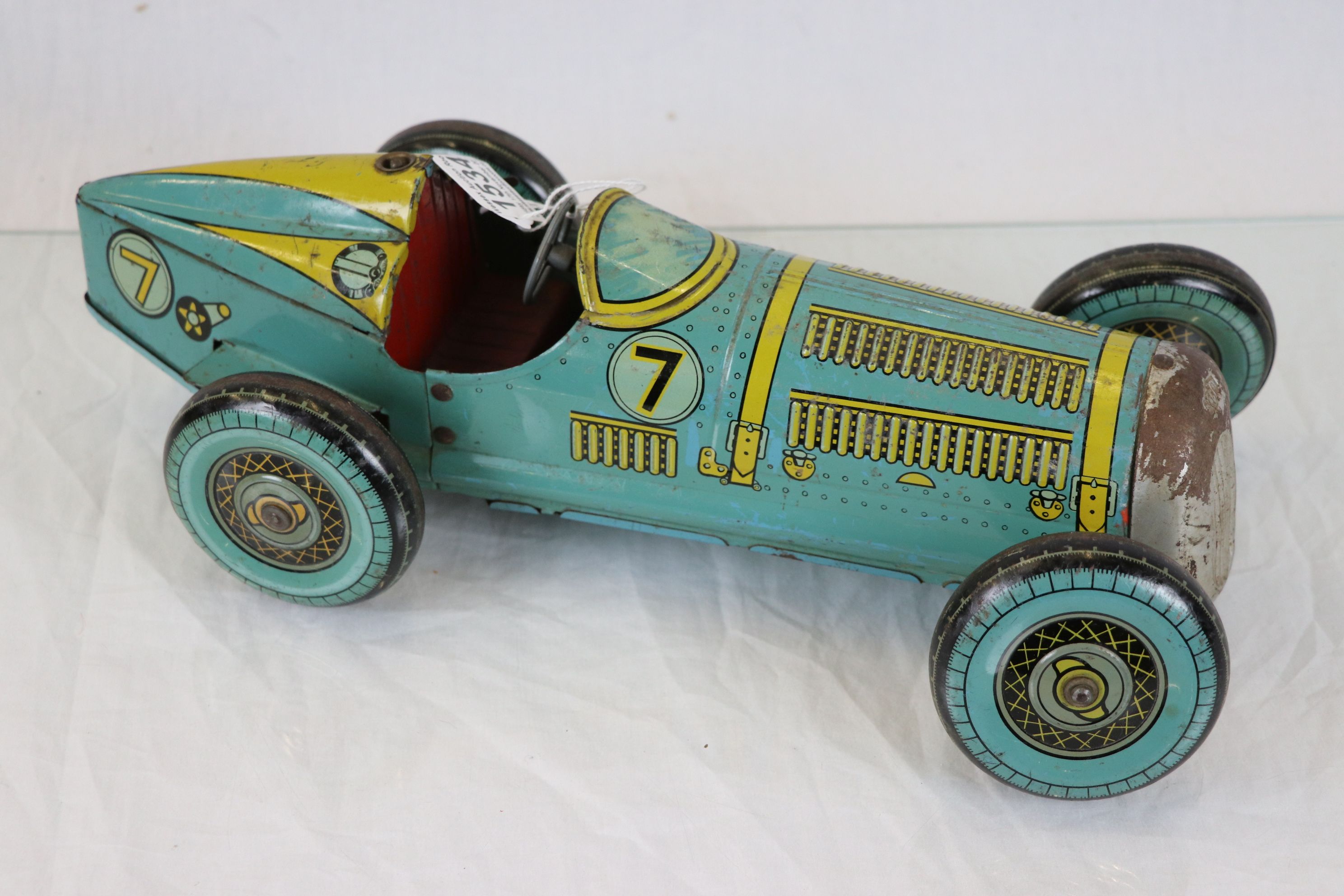 Mettoy tin plate clockwork racing car in pale blue with yellow & black ...