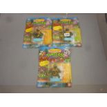 Three original carded Playmates Bandai Teenage Mutant Hero Turtles to include 2 x Sword Slicing