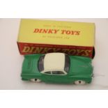 Boxed Dinky 187 Volkswagen Karmann Ghia Coupe in green with cream roof and cream wheels, diecast