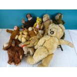 A quantity of vintage monkey toys including some straw filled