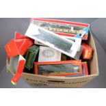 Collection of OO gauge model railway to include boxed rolling stock items, trackside buildings,
