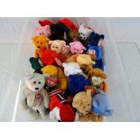 Twenty Four Ty Beanies Bears, all with labels to ears