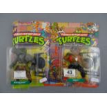 Two original carded Playmates Bandai Teenage Mutant Hero Turtles figures to include Bebop &