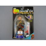 Original carded LJN Thundercats Capt. Shiner figure in vg condition with slight creasing to top