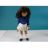 Original Sasha doll in blue top. white skirt and yellow tinted sunglasses, dark brown hair, vg