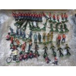 Over 55 various metal soldiers to include examples from Britains