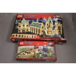 Two boxed Lego Harry Potter sets to include 4842 Hogwarts Castle and 4737 Quidditch Match, unchecked