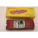 Boxed Dinky 555 Cabriolet Ford Thunderbird French verison in dark red, with driver, white tyres,