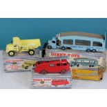 Three boxed Dinky Supertoys to include 965 Euclid Read Dump Truck, 955 Fire Engine with extending