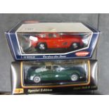Two boxed 1:18 diecast vehicles to include Kyosho Mercedes Benz 300SL (red) and Maisto Jaguar Mk
