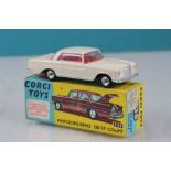 Boxed Corgi 230 Mercedes Benz 220 SE Coupe in cream with red interior, diecast excellent,box vg
