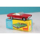 Boxed Corgi 246 Chrysler Imperial in red with golf clubs, driver & passenger, diecast & box