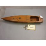 Kellner clockwork Speed boat with wooden hull, approx 25" in length, with key