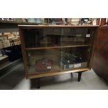 Heal's of London 1950's Teak Side Cabinet with Two Glass Sliding Doors raised on Dark Stained Square