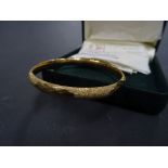 9ct 8mm gold bangle, boxed with original receipt, approx 8g