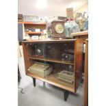 Heal's of London 1950's Teak Side Cabinet with Two Glass Sliding Doors raised on Dark Stained Square