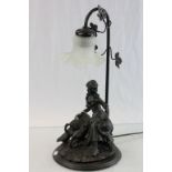 Metal based lamp featuring a Girl with Geese